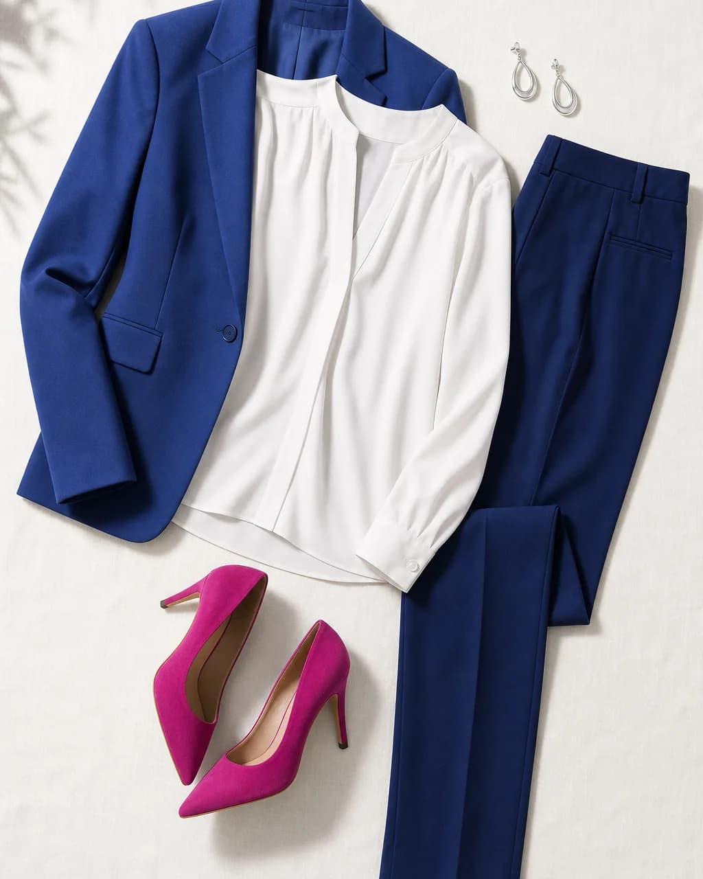 Bright Winter work outfit: blazer in Navy Blue #2C4898, blouse in Icy White #F8F4F8, trousers in Deep Navy #1C3880, pumps in Fuchsia #C83888